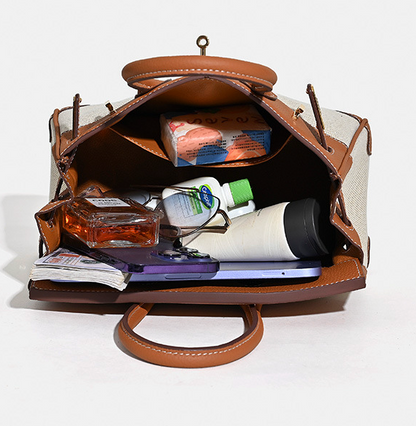 Jane Riviera 25 – Tasche aus echtem Togo-Leder und Platin-Canvas
