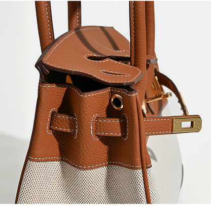 Jane Riviera 25 – Tasche aus echtem Togo-Leder und Platin-Canvas