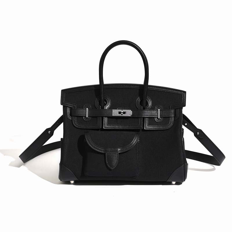 Jane Explorer 30 – Tasche aus Togo-Leder und Premium-Canvas