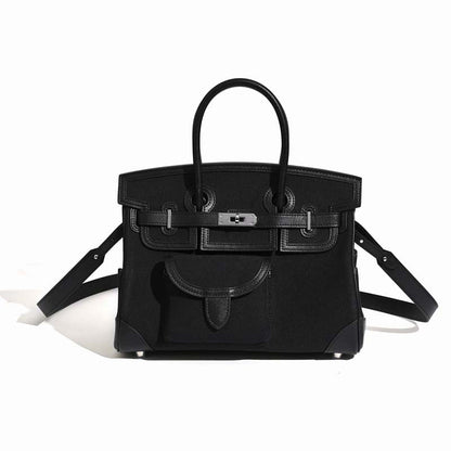 Jane Explorer 30 – Tasche aus Togo-Leder und Premium-Canvas