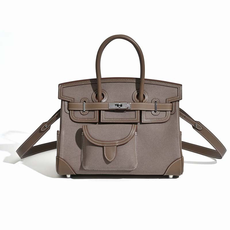 Jane Explorer 30 – Tasche aus Togo-Leder und Premium-Canvas