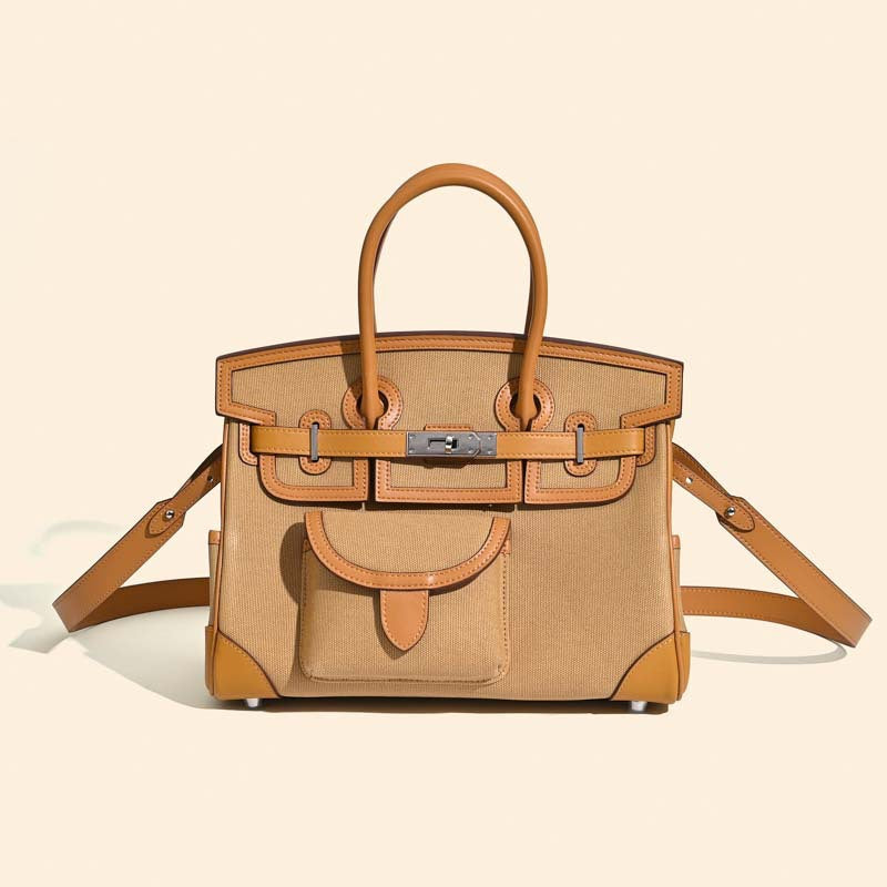Jane Explorer 30 – Tasche aus Togo-Leder und Premium-Canvas